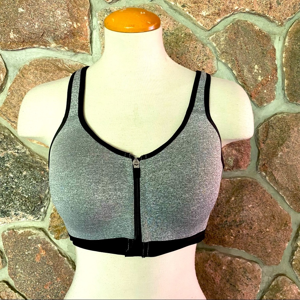 Zip front sports bra with cross cross back straps.